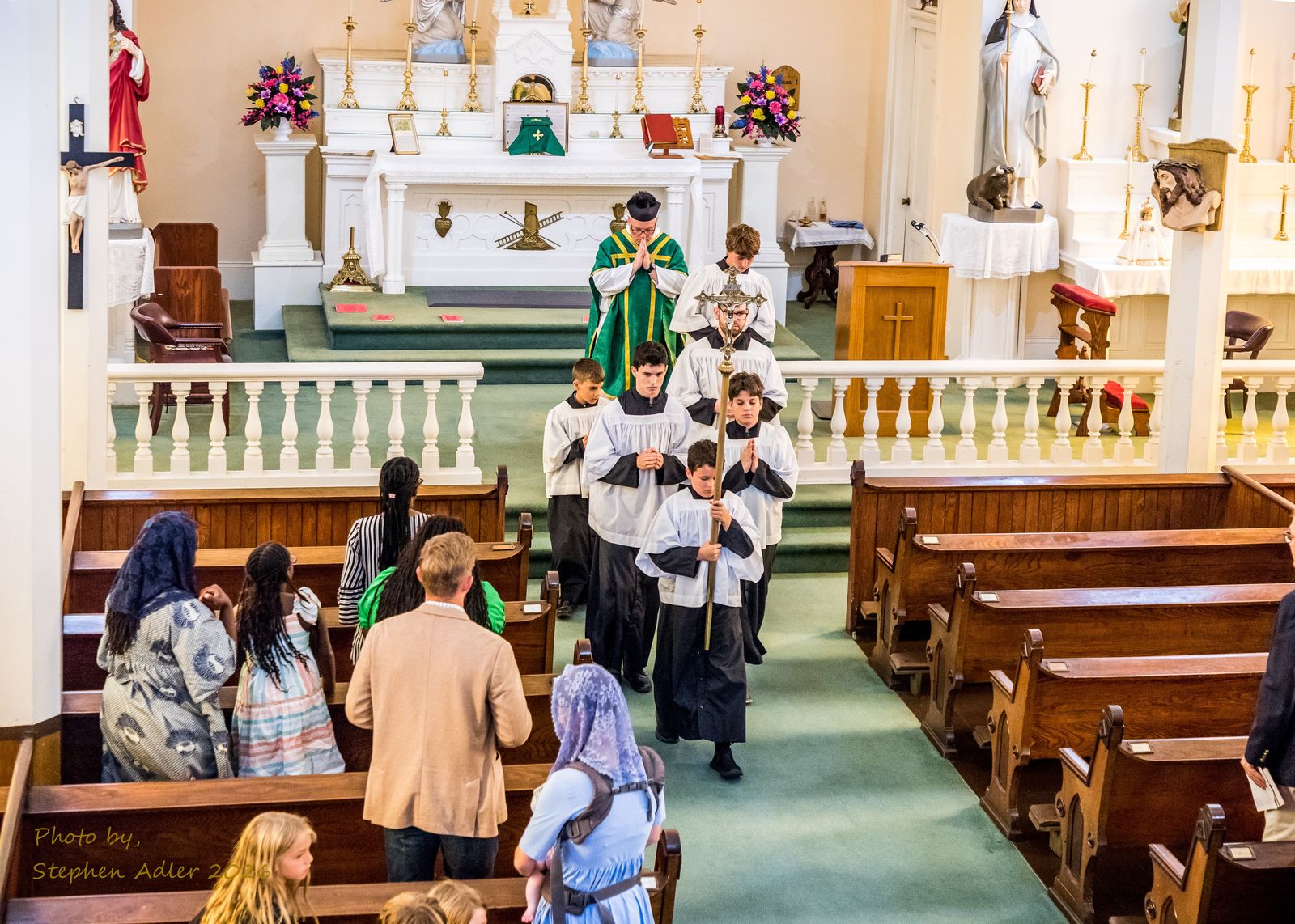 Servers and faithful at the Traditional Latin Mass